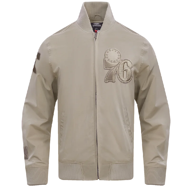 NBA PHILADELPHIA 76ERS NEUTRAL TWILL JACKET (TAUPE) One-Shoulder Jacket Off-the-Shoulder Jacket Asymmetrical Jacket